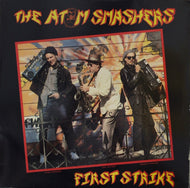 ATOM SMASHERS / First Strike