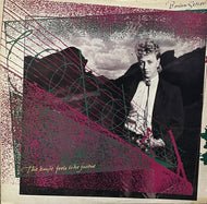 BRIAN SETZER / The Knife Feels Like Justice (EMI America, ST-17178, LP)