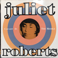 JULIET ROBERTS / CAUGHT IN THE MIDDELE