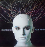 MORT GARSON / ELECTRONIC HAIR PIECES