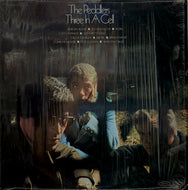 PEDDLERS / THREE IN A CELL